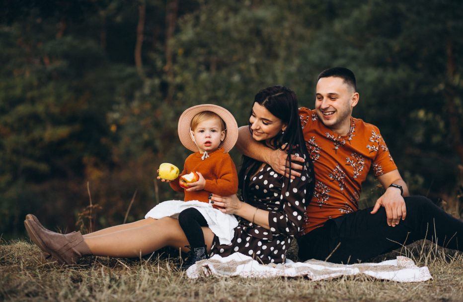 Family with their little daughter having picnic in Kashmir